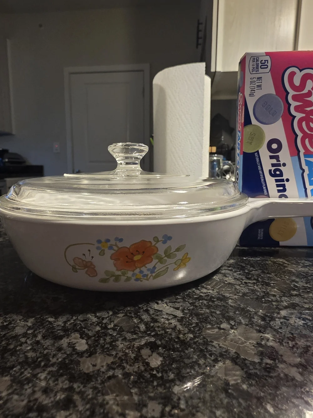 The Corning Ware Wildflower Saucepan/Skillet with Pyrex Lids.